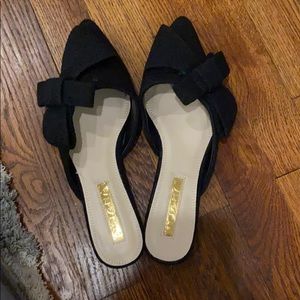 Black backless bow flats